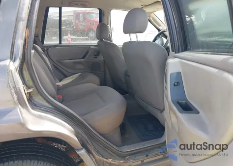 2002 Jeep Grand Cherokee Laredo from USA, damaged, VIN 1J4GX48S82C227035